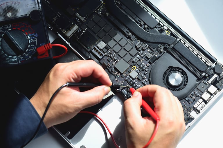MacBook motherboard repair by technician